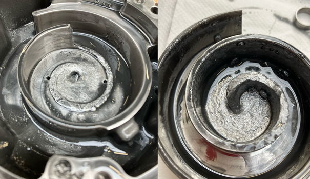   Fotobijschrift: Vloeistofslag bij een scrollcompressor. Het binnenste deel van de stator (links) is afgebroken omdat vloeistof niet samengeperst kan worden